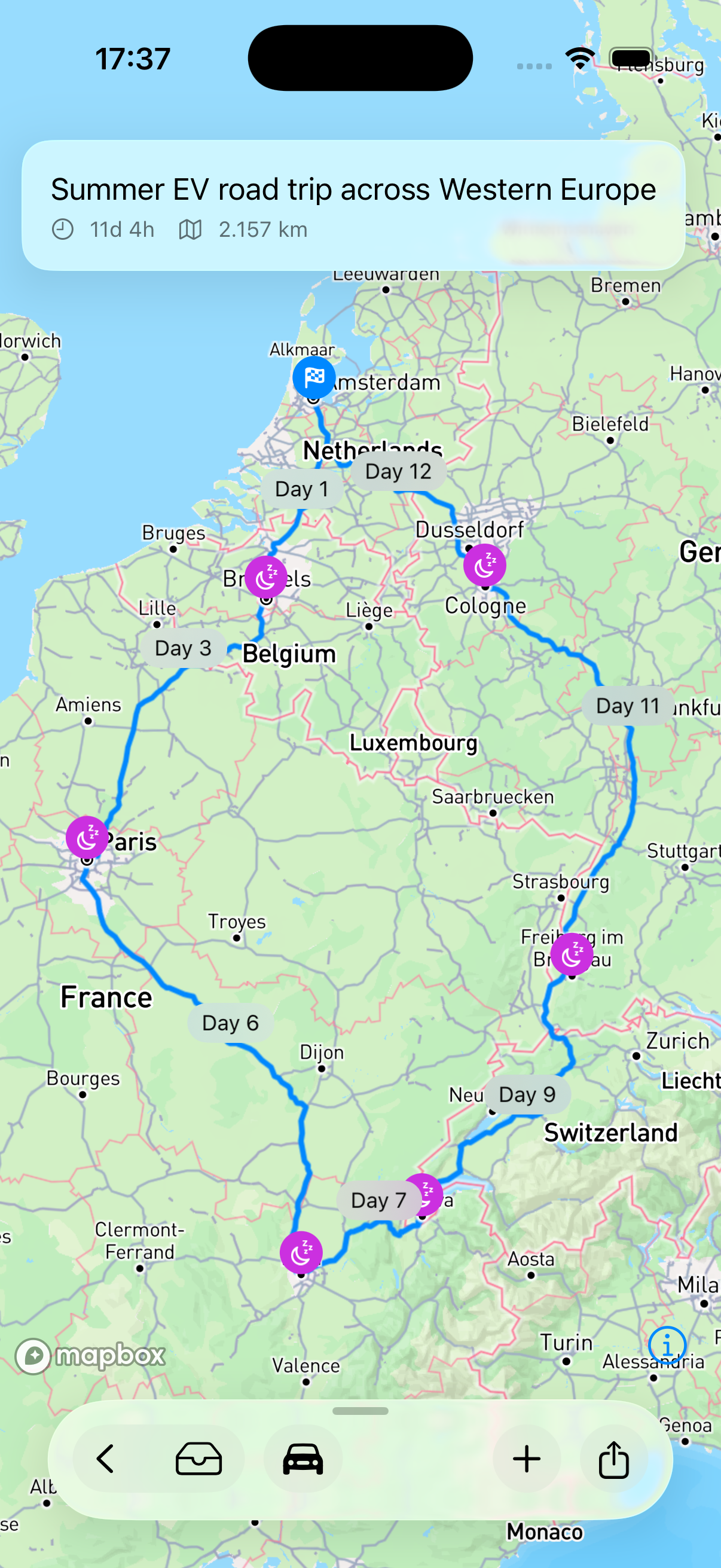 The Western Europe loop in Fernweh โ full map showing all eight stops from Amsterdam down through Brussels, Paris, Lyon, Geneva and Freiburg back up to Cologne, with the day-numbered route line visible across France, Switzerland and Germany